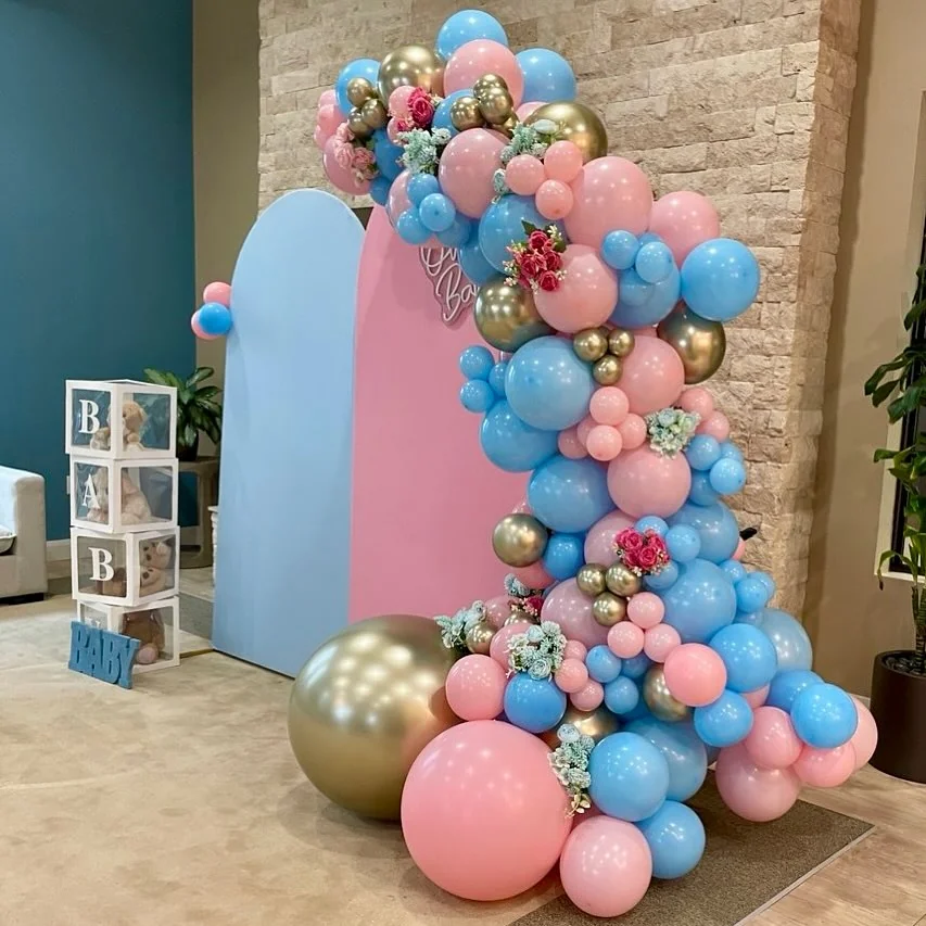 Personalized baby shower balloon display with custom backdrop