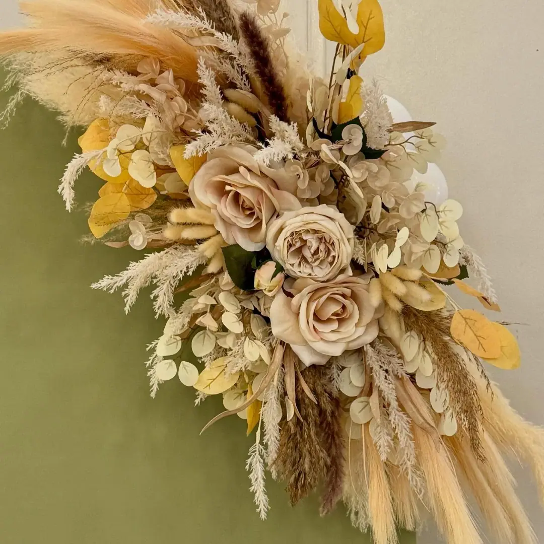 Boho neutral balloon garland in cream, terracotta and sand tones with dried florals